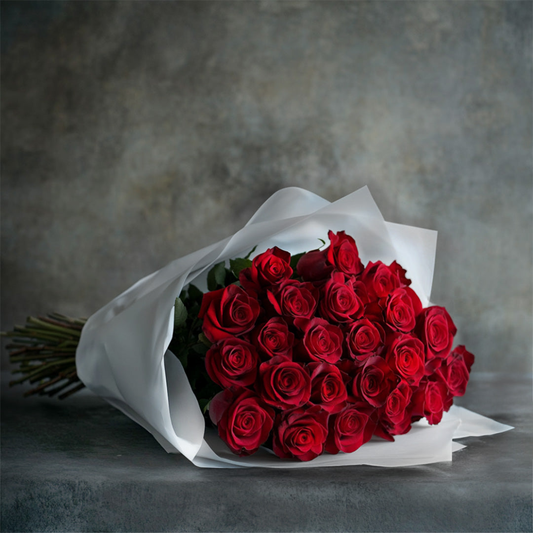 Long-stem red rose bouquet wrapped in white paper – luxury romantic flowers for Mother's Day, anniversary, Valentine's Day, or elegant celebration gift