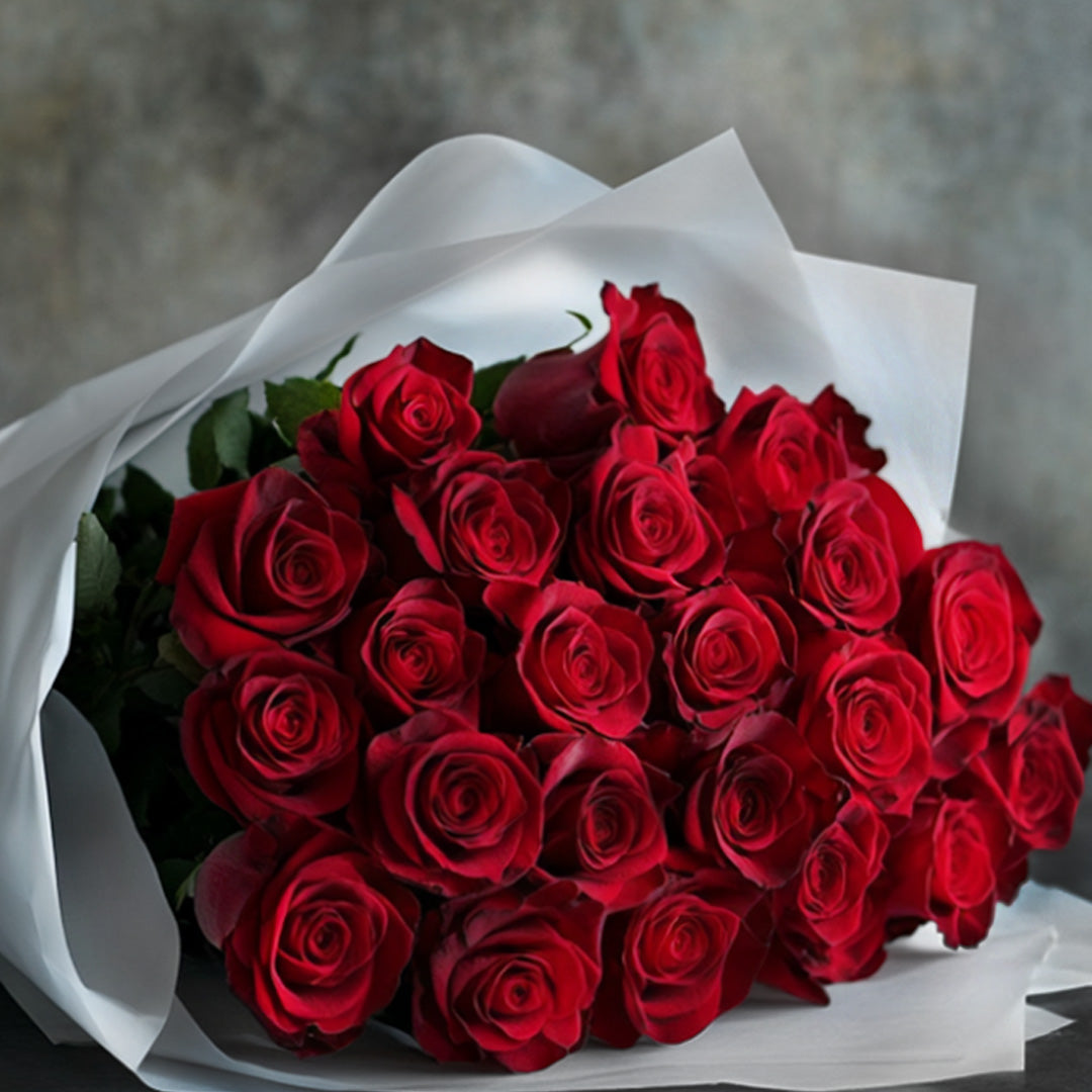 Romantic red rose bouquet wrapped in white paper – elegant floral gift for Mother's Day, anniversaries, Valentine's Day, or luxury romantic surprise
