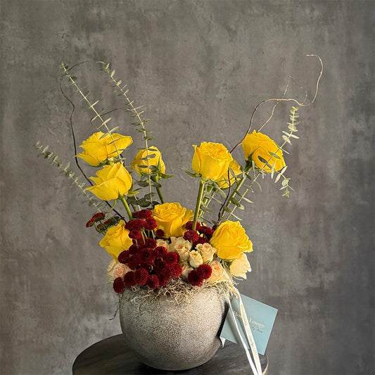 Golden Garnet – Yellow Roses & Burgundy Vase
